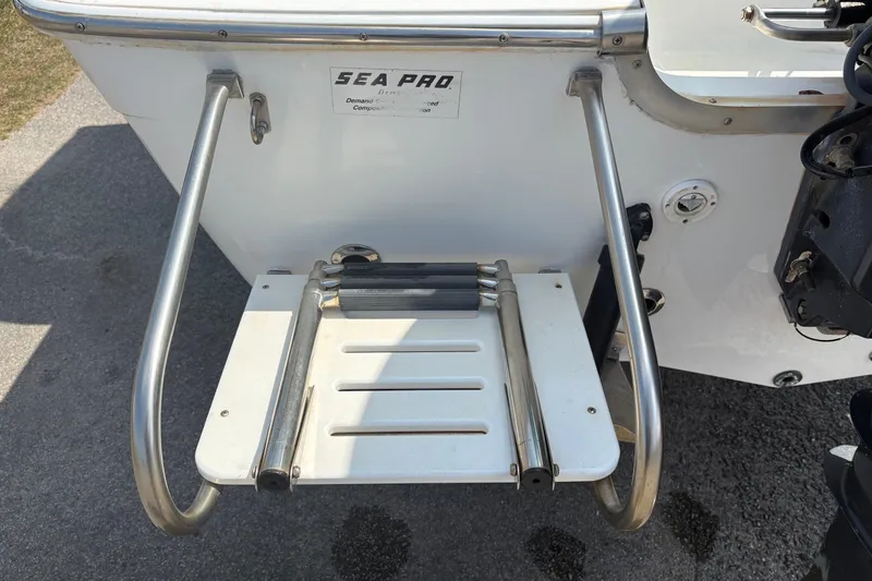 Slide: The Image of 2005 Sea Pro 190 Center Console boat with stainless steel swim ladder. - 11