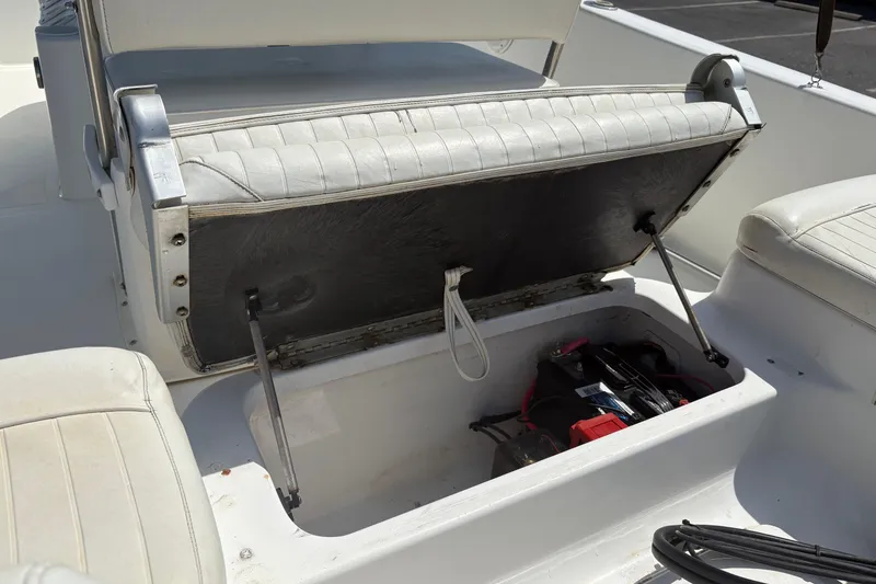 Slide: The Image of Open storage compartment in 2005 Sea Pro 190 Center Console boat. - 12