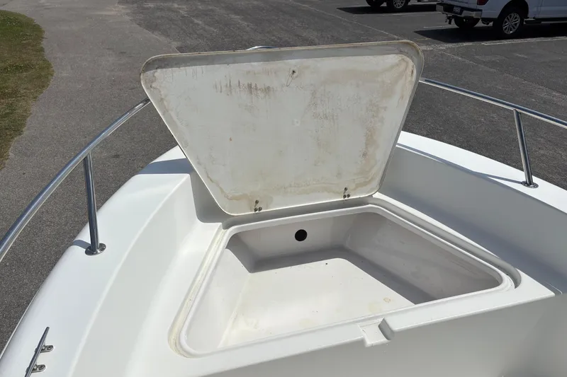 Slide: The Image of Open storage compartment on 2005 Sea Pro 190 Center Console boat. - 20