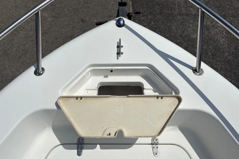 Slide: The Image of Bow storage compartment on a 2005 Sea Pro 190 Center Console boat. - 21