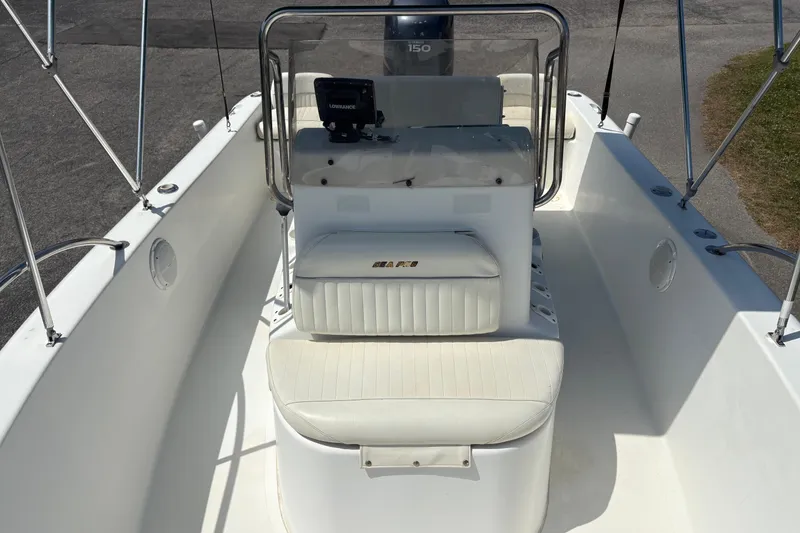 Slide: The Image of 2005 Sea Pro 190 Center Console boat interior with seating and console view. - 22