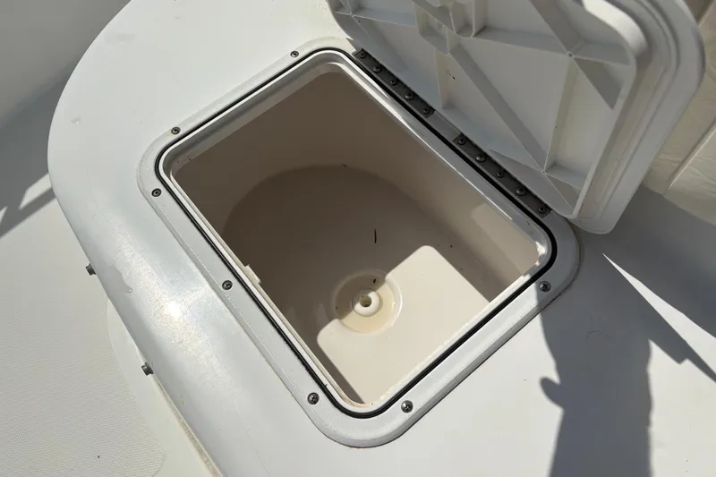 Slide: The Image of Open storage compartment on 2005 Sea Pro 190 Center Console boat. - 23