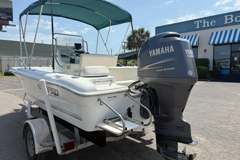 Slide: The Image of 2005 Sea Pro 190 Center Console boat with Yamaha 150 outboard motor on trailer. - 3