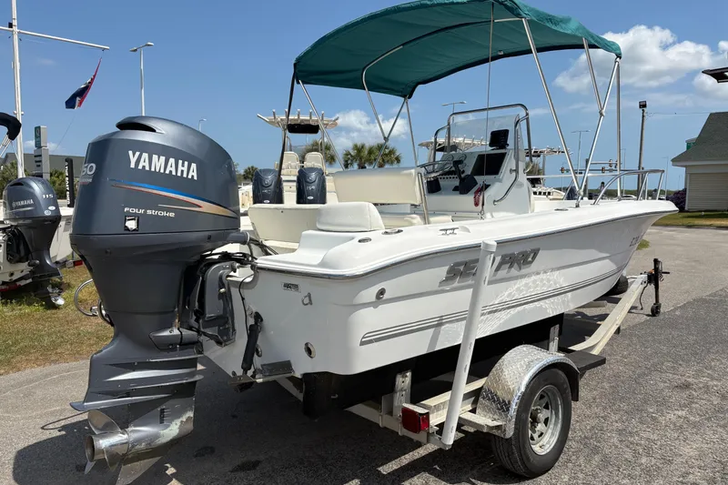 Slide: The Image of 2005 Sea Pro 190 Center Console boat with Yamaha outboard motor on trailer. - 5