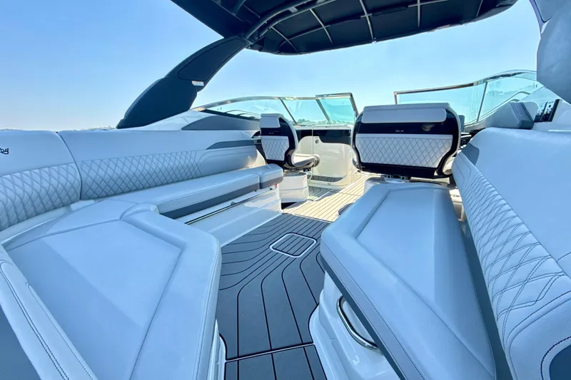 Slide: The Image of Luxurious interior of 2025 Sea Ray SLX 280 boat with elegant seating and modern design. - 10