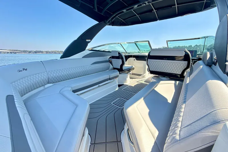 Slide: The Image of Luxurious interior of 2025 Sea Ray SLX 280 boat with elegant seating and modern design. - 11