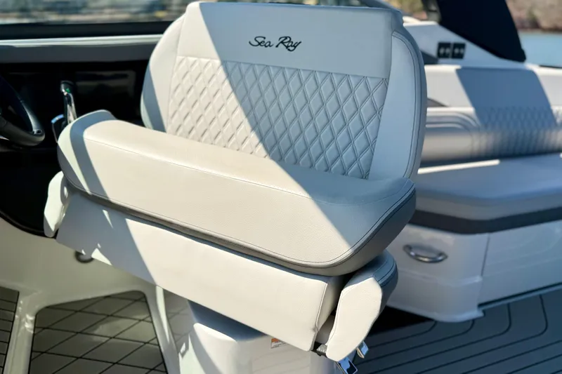 Slide: The Image of 2025 Sea Ray SLX 280 boat seat with diamond stitching and elegant design. - 14