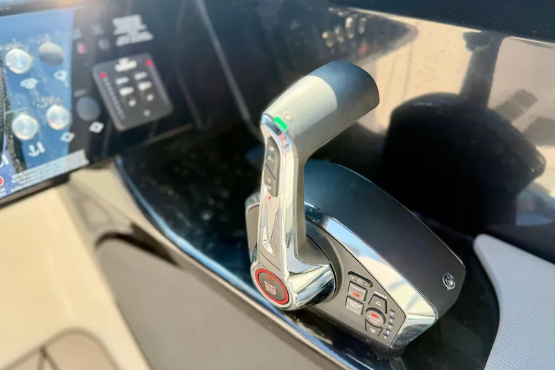 Slide: The Image of Throttle control of 2025 Sea Ray SLX 280 boat, featuring modern design and controls. - 16