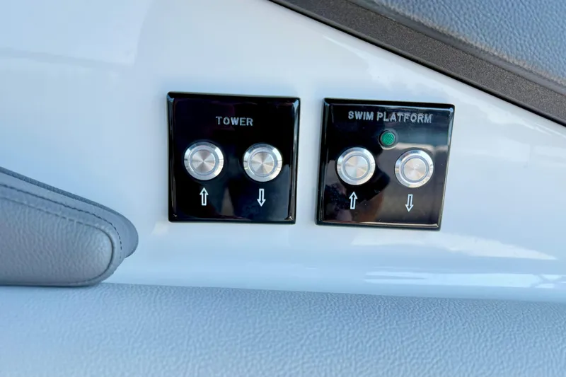 Slide: The Image of Control panel for tower and swim platform on 2025 Sea Ray SLX 280 boat. - 17