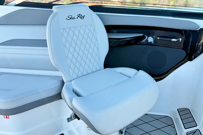 Slide: The Image of 2025 Sea Ray SLX 280 boat seat with elegant white upholstery and diamond stitching. - 18