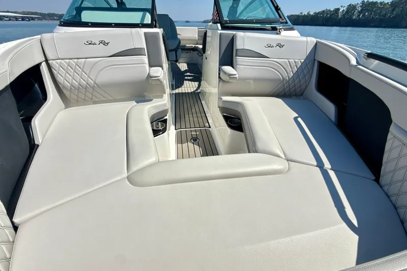 Slide: The Image of 2025 Sea Ray SLX 280 boat interior with luxurious seating and elegant design. - 22