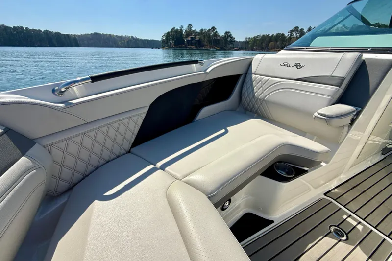 Slide: The Image of Luxurious seating on 2025 Sea Ray SLX 280 boat, featuring elegant design and waterfront view. - 23