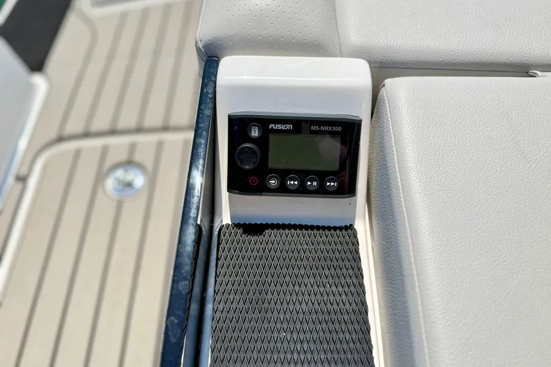 Slide: The Image of Fusion MS-NRX300 audio control on 2025 Sea Ray SLX 280 boat deck. - 31