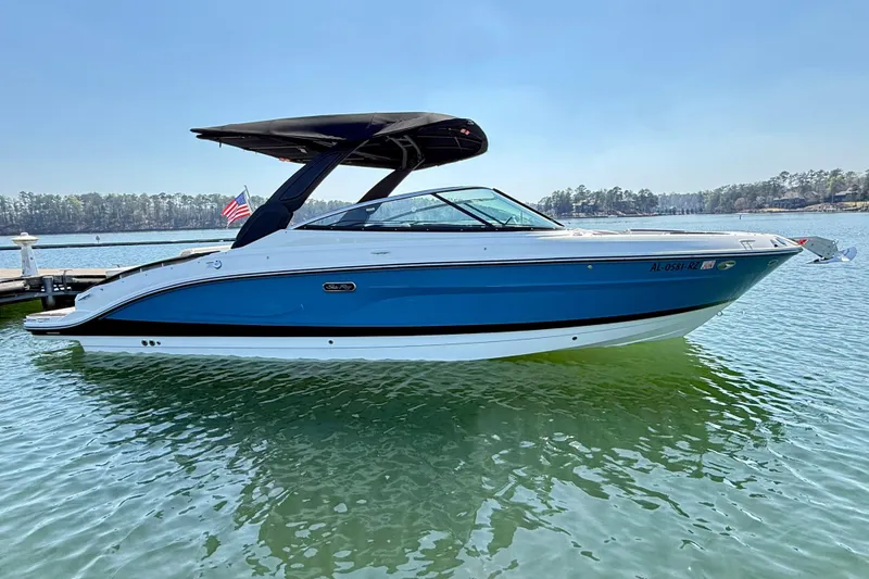 Slide: The Image of 2025 Sea Ray SLX 280 boat on calm water. - 7