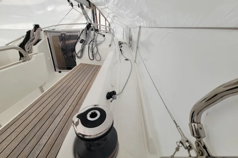 Slide: The Image of Beneteau Oceanis 30.1 yacht deck, featuring sleek design and modern rigging, 2020 model. - 11