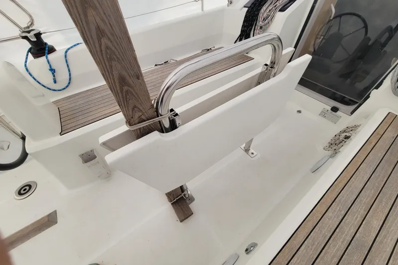 Slide: The Image of Beneteau Oceanis 30.1 cockpit detail, featuring teak flooring and stainless steel fittings, 2020 model. - 15