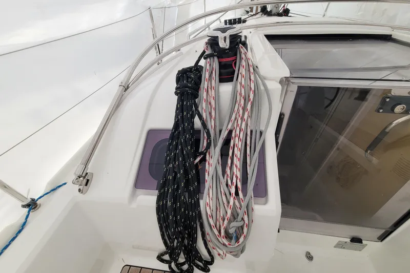 Slide: The Image of Beneteau Oceanis 30.1 sailboat cockpit with ropes, 2020 model. - 17