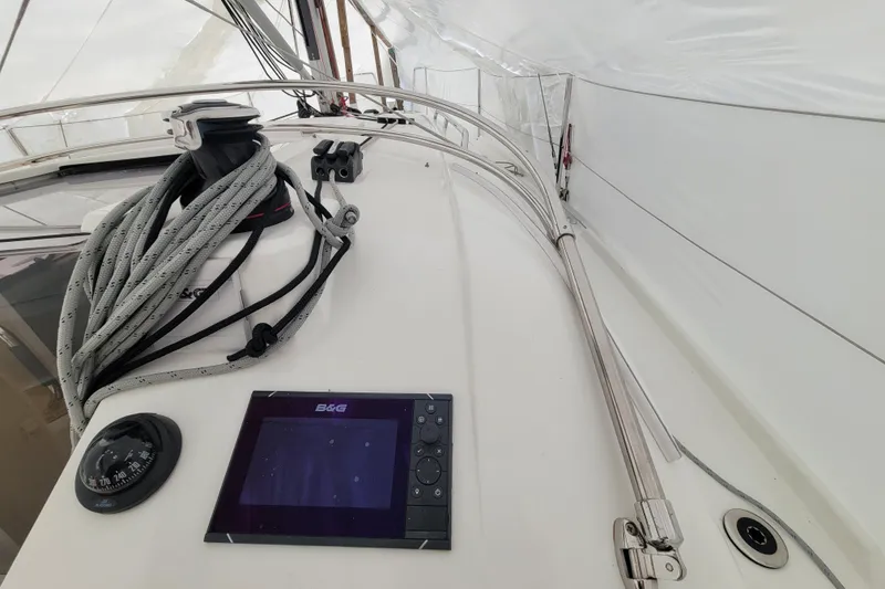 Slide: The Image of Beneteau Oceanis 30.1 sailboat cockpit with navigation equipment and rigging, 2020 model. - 19