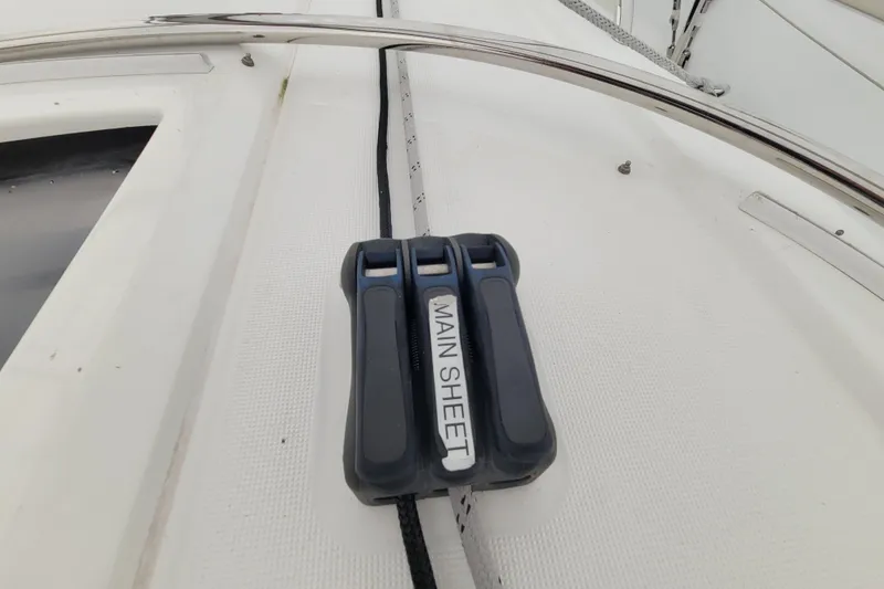Slide: The Image of Main sheet control on 2020 Beneteau Oceanis 30.1 sailboat deck. - 20