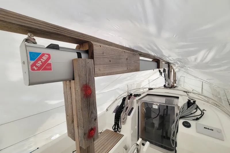 Slide: The Image of Interior view of a 2020 Beneteau Oceanis 30.1 sailboat under protective cover. - 22