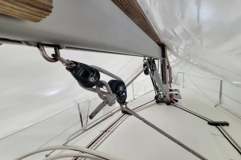 Slide: The Image of Close-up of rigging on a 2020 Beneteau Oceanis 30.1 sailboat under a protective cover. - 23