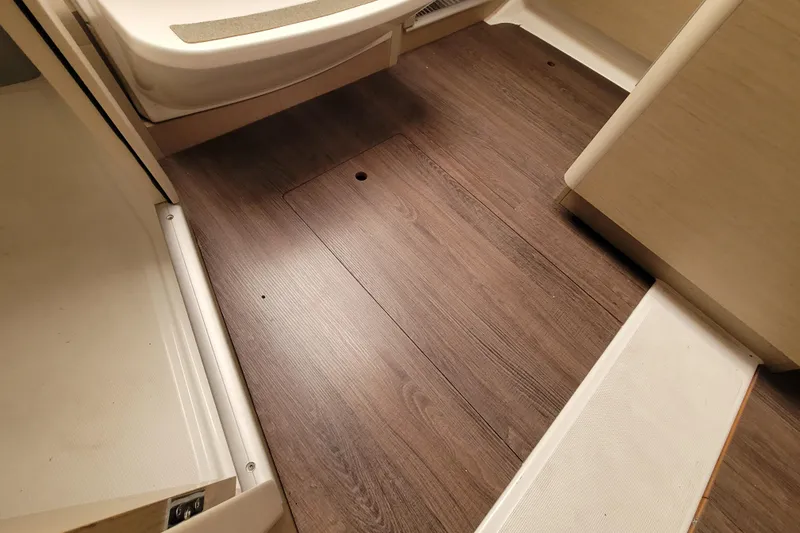 Slide: The Image of Interior view of 2020 Beneteau Oceanis 30.1 yacht with wooden flooring. - 46