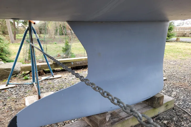 Slide: The Image of 2020 Beneteau Oceanis 30.1 keel on stands, outdoor setting. - 6