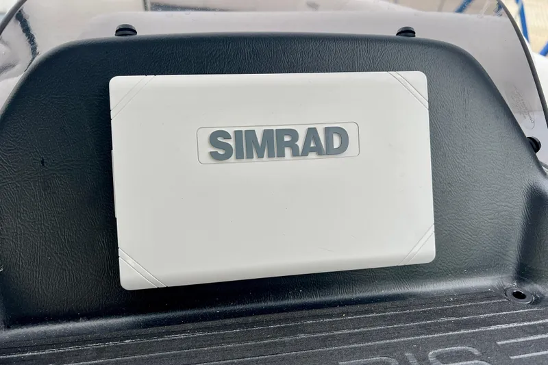 Slide: The Image of Simrad device on Harris Sunliner 230, model 2025. - 16