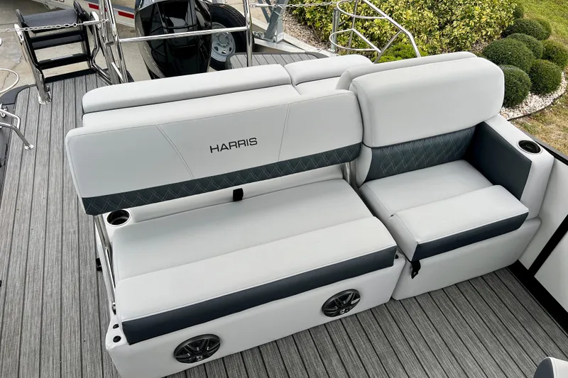 Slide: The Image of Harris Sunliner 230 2025 boat seat with gray upholstery. - 18