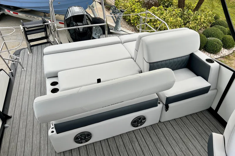 Slide: The Image of Harris Sunliner 230 2025 with luxurious white seating area. - 19