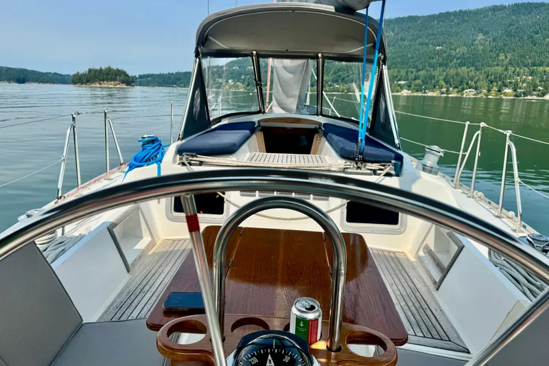 Slide: The Image of Cozy cabin interior of 1988 Hylas 42 yacht with wooden storage shelves. - 20