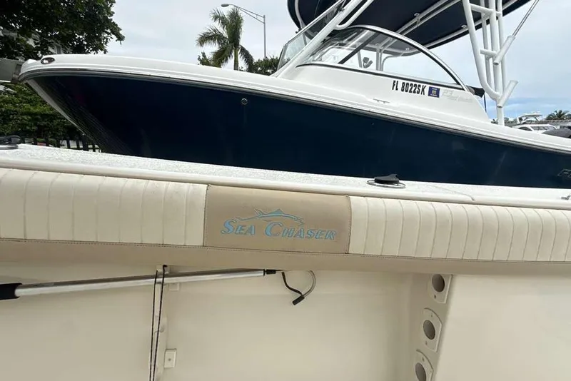 Slide: The Image of 2017 Sea Chaser 24 HFC boat with blue hull and white interior. - 22