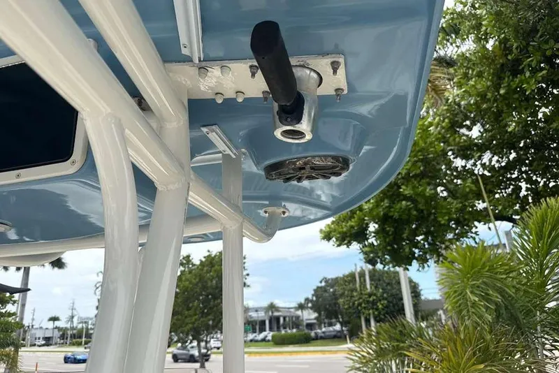 Slide: The Image of 2017 Sea Chaser 24 HFC boat canopy with mounted speaker and rod holder. - 30