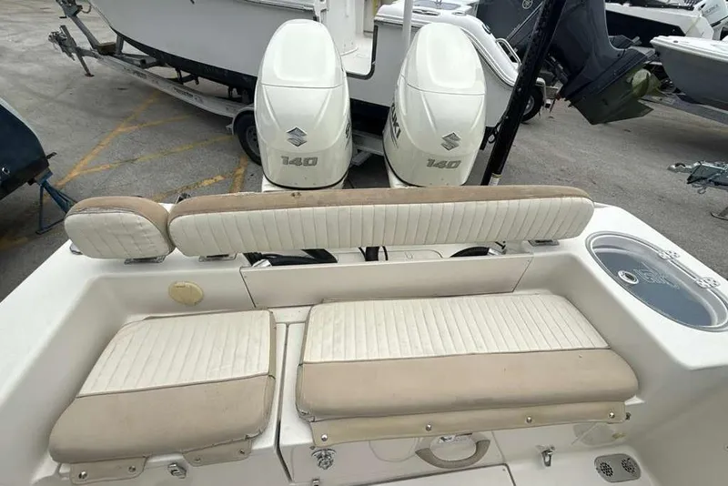 Slide: The Image of 2017 Sea Chaser 24 HFC boat with dual Suzuki 140 engines and cushioned seating. - 31