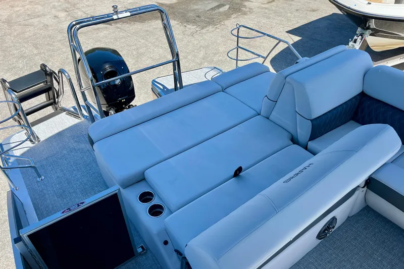 Slide: The Image of Harris Sunliner 210 2025 with luxurious lounging area and motor. - 12