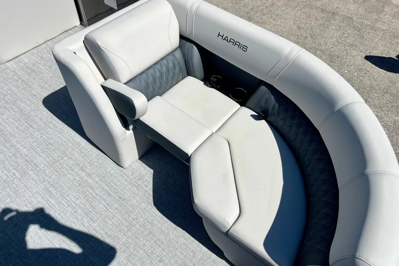 Slide: The Image of Harris Sunliner 210 2025, luxurious boat seating in white and gray. - 14