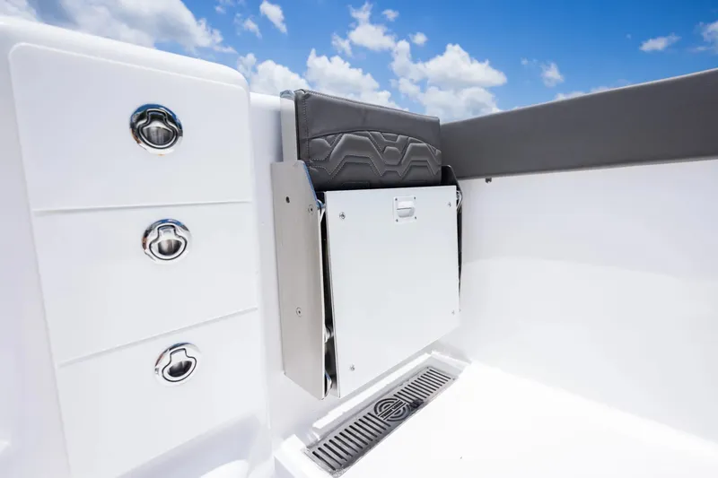 Slide: The Image of 2026 Twin Vee 340 GFX CC boat interior with sleek storage compartment and modern design. - 14