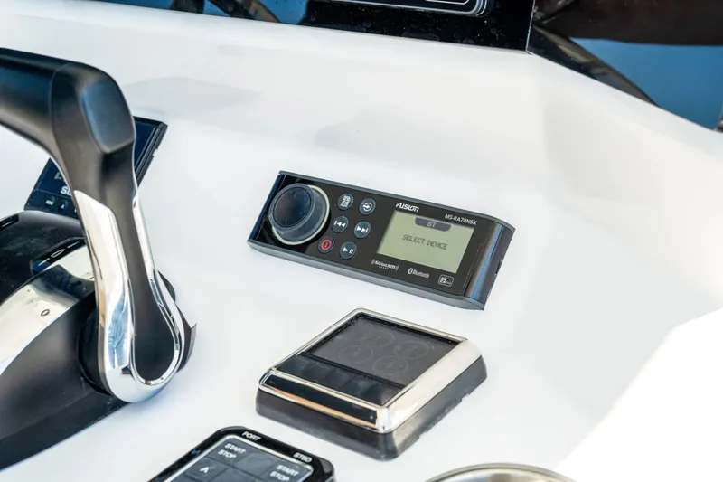 Slide: The Image of Control panel of 2026 Twin Vee 340 GFX CC boat with modern navigation equipment. - 9