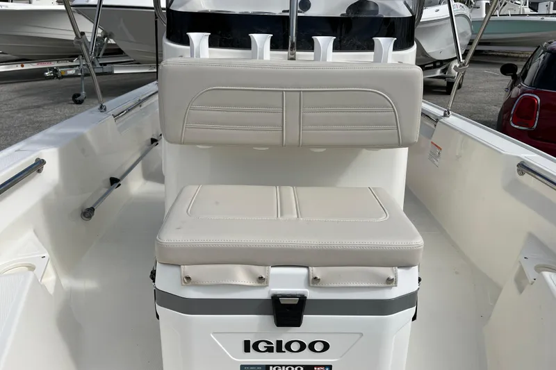 Slide: The Image of Interior of a 2026 Boston Whaler 150 Montauk with Igloo cooler. - 11