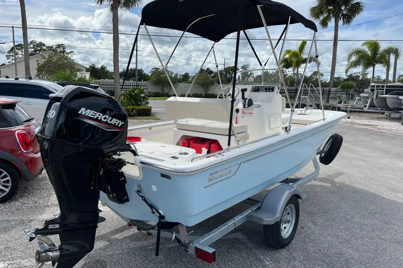 Slide: The Image of 2026 Boston Whaler 150 Montauk boat with Mercury engine. - 8
