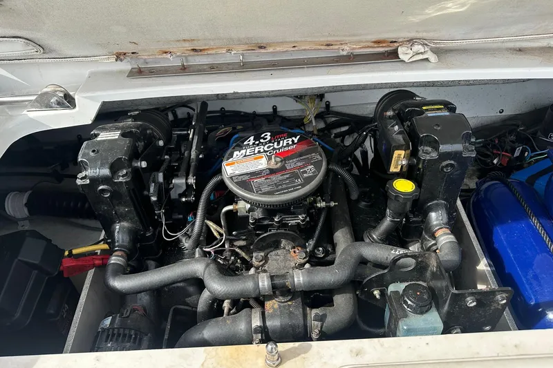 Slide: The Image of Engine compartment of a 2007 Crownline 19 SS boat with a 4.3L Mercury engine. - 10