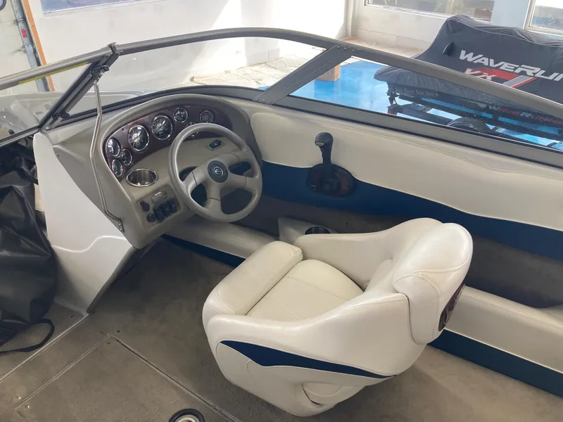 Slide: The Image of Interior of a 2007 Crownline 19 SS boat with steering console. - 5