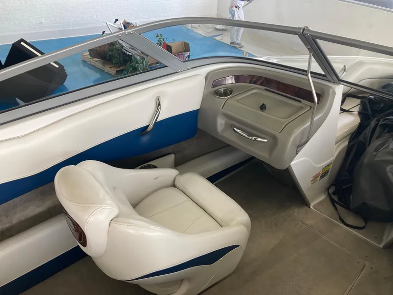 Slide: The Image of Interior of a 2007 Crownline 19 SS boat with white seats. - 7
