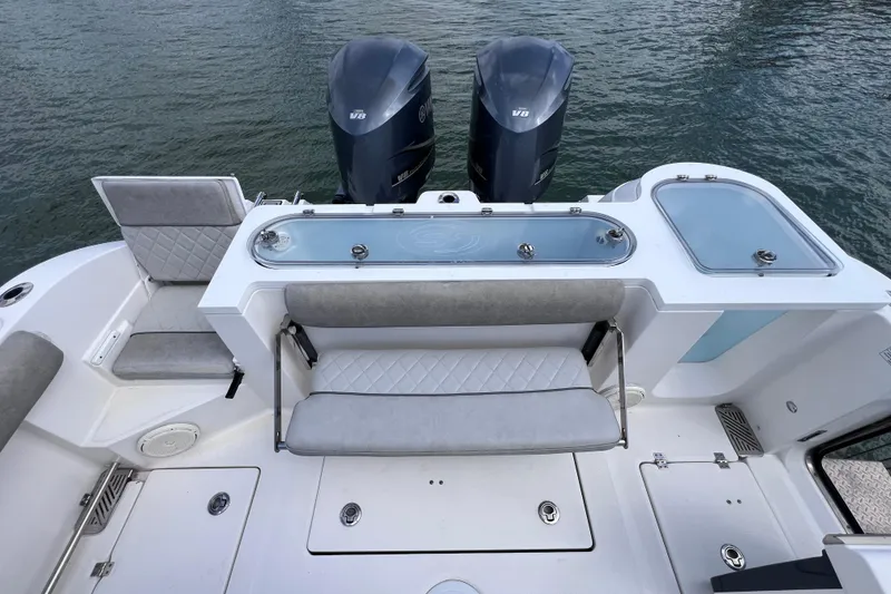 Slide: The Image of 2019 Sea Fox 328 Commander boat with dual V8 engines and seating area. - 19