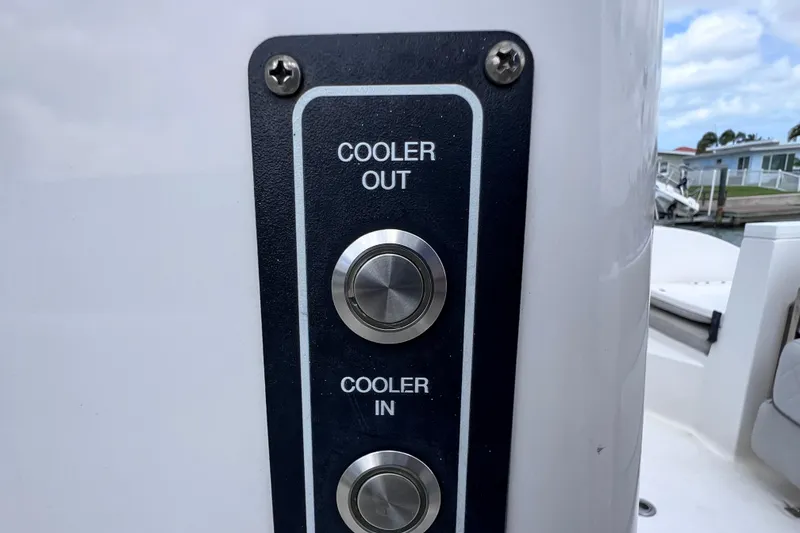 Slide: The Image of Control panel on a 2019 Sea Fox 328 Commander boat, featuring cooler buttons. - 24