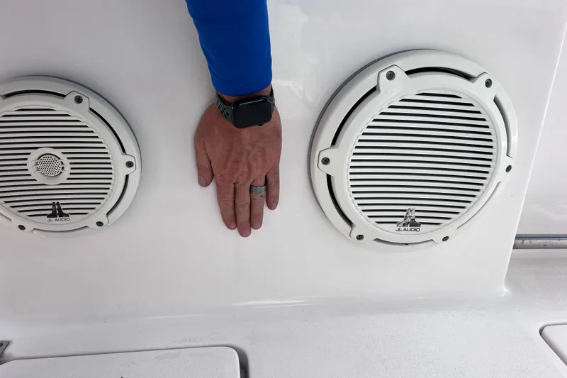 Slide: The Image of Hand near JL Audio speakers on 2019 Sea Fox 328 Commander boat. - 30
