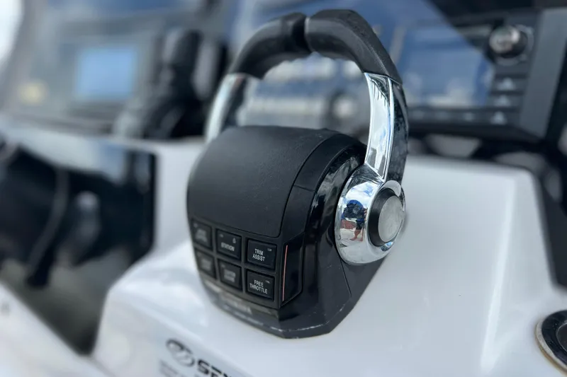 Slide: The Image of Close-up of 2019 Sea Fox 328 Commander boat throttle control. - 35