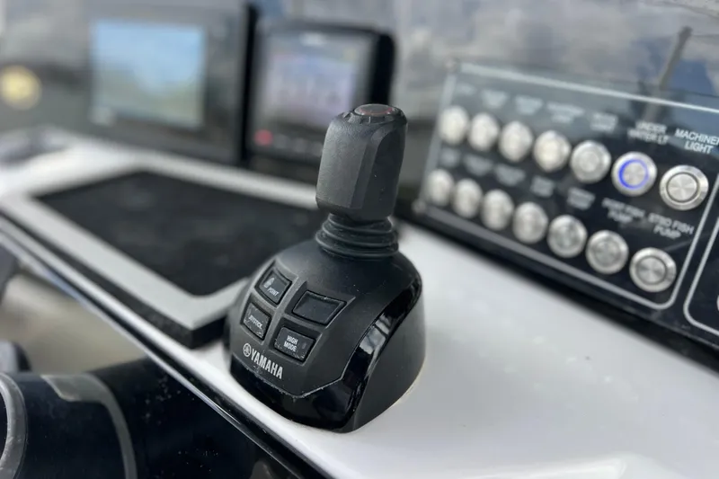 Slide: The Image of Yamaha joystick control on 2019 Sea Fox 328 Commander boat dashboard. - 36