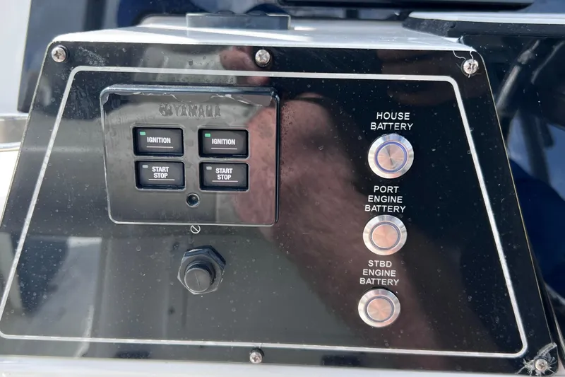 Slide: The Image of Control panel of a 2019 Sea Fox 328 Commander boat with ignition and battery switches. - 41