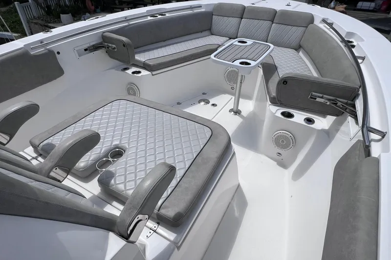 Slide: The Image of Luxurious seating area on 2019 Sea Fox 328 Commander boat with gray upholstery. - 47